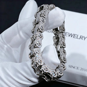 White gold plated 11mm full iced out bike chain link bracelet for men hip hop street jewelry, fully paved flawless VVS simulated diamond motorcycle link wrist chain with hand set no glue stones, close-up shot held by white soft cotton glove against white brand box printed RDRIP JEWELRY SINCE 2016, ultra bling all-angle shine heavy drip biker bracelet available in 7 inch 8 inch sizes premium men statement accessory gift RDRIP JEWELRY
