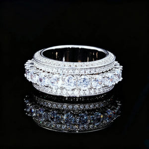 front view white gold tone five‑row full paved iced out band ring for men heavy hip hop wide eternity ring AAA cubic zirconia micro pave hand set stones bling luxury men statement jewelry on black reflective background RDRIP JEWELRY SINCE 2016
